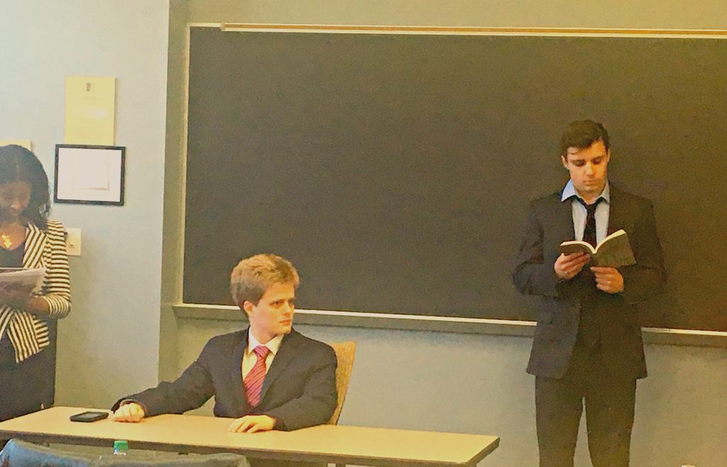 li, played by author Sam Hickey, unsuccessfully petitions the Deputy Minister of Justice for the release of his sister, Noor, in an American University stage reading of Prof. Akbar Ahmed's play, Noor, 