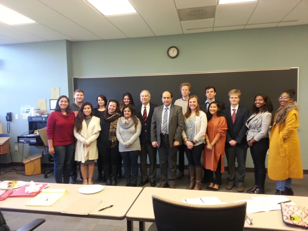 Ambassador Akbar Ahmed and judge Ali Imran (center) gather with Ahmed's World of Islam students at American University following their stage reading of Ahmed's play, Noor.