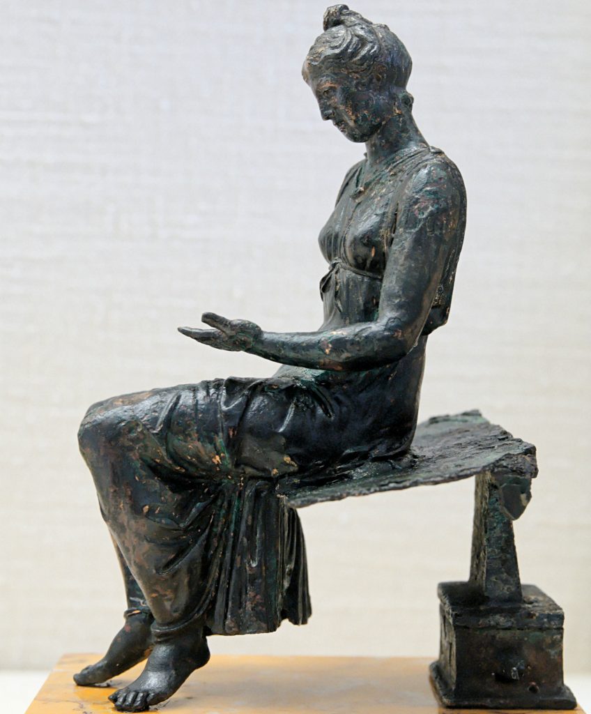 Bronze statue of a young girl reading Photo: Unknown Français : Anonyme (Marie-Lan Nguyen (User:Jastrow), 2008-04-11) [CC BY 2.5 (http://creativecommons.org/licenses/by/2.5)], via Wikimedia Commons