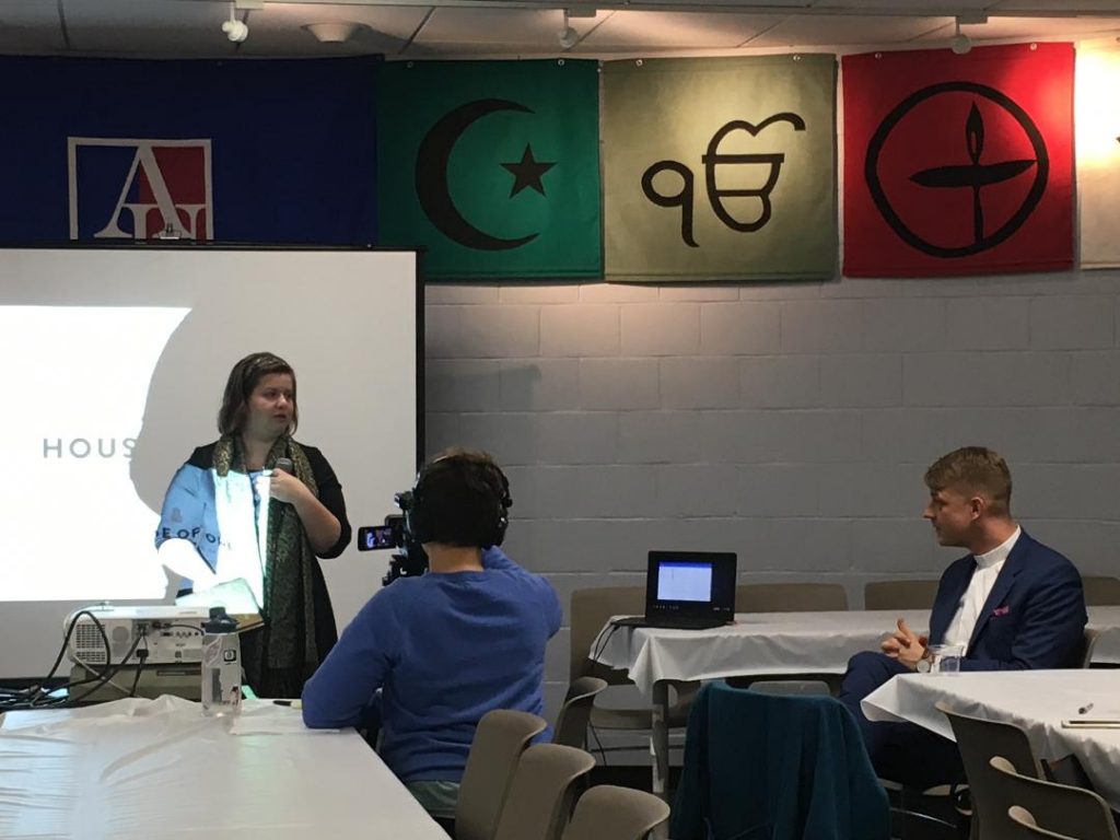 Author Anna Brosius welcomes the House of One delegation to American University on behalf of Ambassador Akbar Ahmed, the Ibn Khaldun Chair of Islamic Studies at American University, at a Table Talk lecture on Nov. 16.