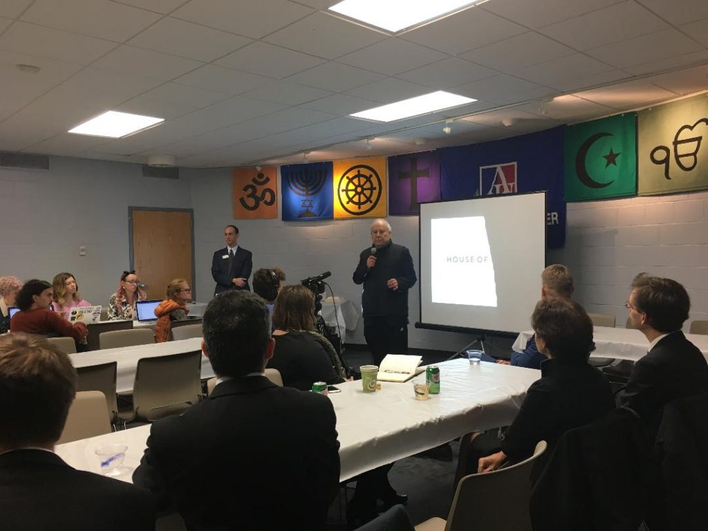 Ambassador Akbar Ahmed delivers opening remarks to the House of One delegation upon their visit to American University from Berlin on Nov. 16, emphasizing the importance of strengthening interfaith initiatives in the US, Europe, and around the globe. 